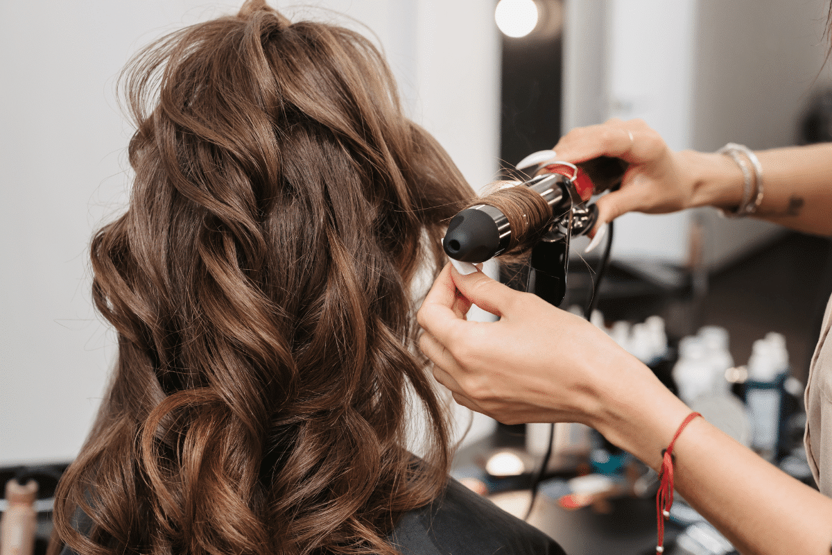 Hair Styling 2 Brunette woman having her hair styled for a Bat Mitzvah