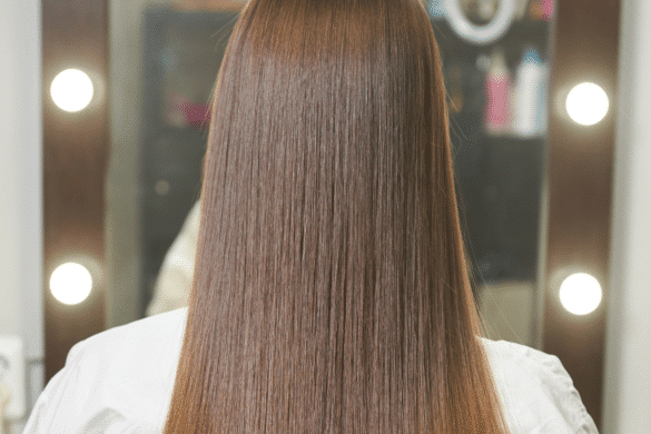Brazilian Blowout After image of the back of a woman's head with long hair.