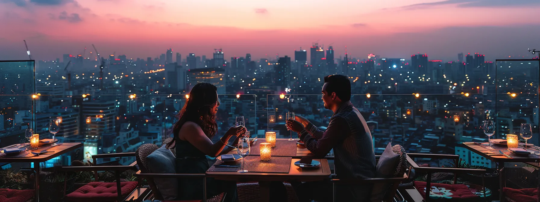 Discover North Dallas' Premier Fine Dining Destinations 2 a couple enjoying a romantic dinner on a rooftop restaurant with a panoramic view of the city skyline.