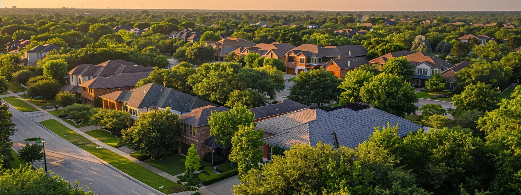 Analyzing North Dallas Home Price Trends 2 a spacious suburban neighborhood in north dallas with large, modern homes surrounded by lush greenery.