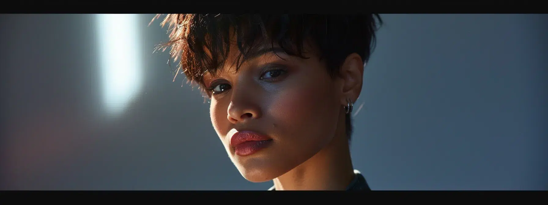 Pixie Cut Styling Tips for Every Face Shape 1 a woman with a pixie cut styled differently to suit various face shapes.