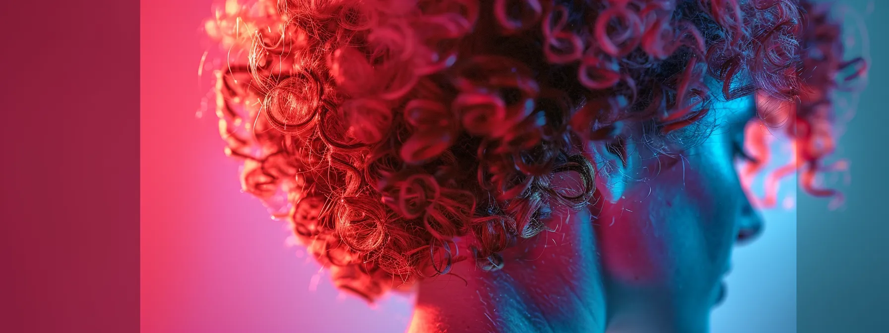 vibrant curly hair styled in an eye-catching asymmetrical cut, showcasing a trendy and edgy look. vibrant curly hair styled in an eye-catching asymmetrical cut, showcasing a trendy and edgy look.